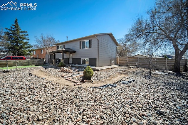 2219 Sonoma Dr, Colorado Springs, CO 80910 - rear view of property featuring a fenced backyard