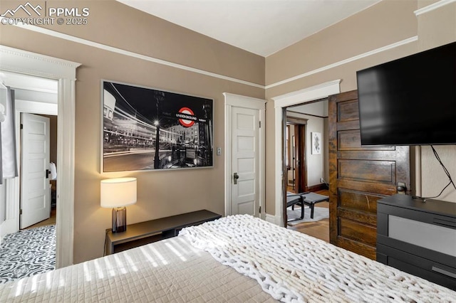 bedroom featuring wood finished floors