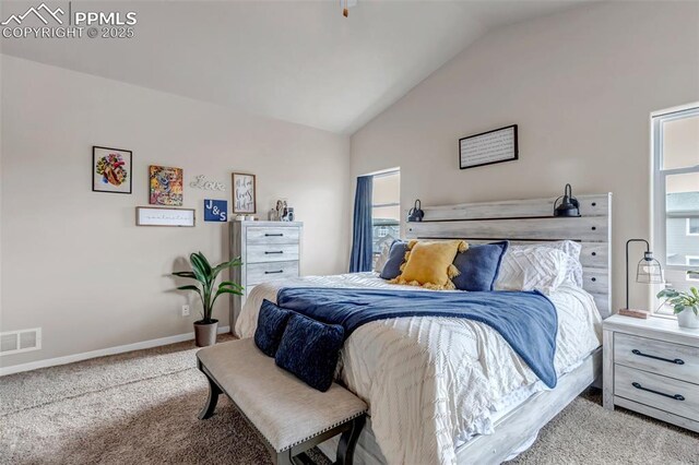 bedroom featuring carpet floors, baseboards, vaulted ceiling, and visible vents