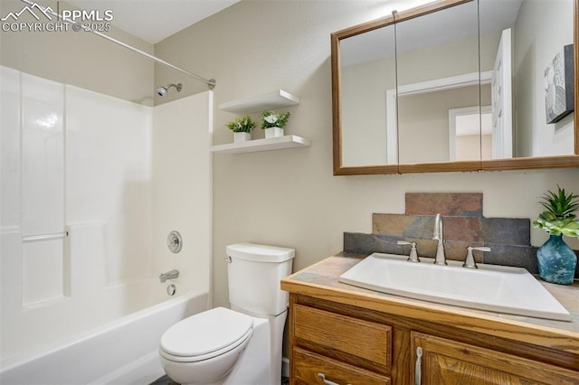 full bath with toilet, vanity, and shower / washtub combination