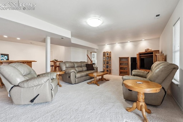 13255 Woodlake Rd, Elbert, CO 80106 - living room featuring stairway, carpet flooring, visible vents, and recessed lighting