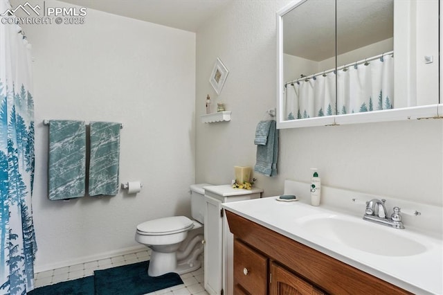 13255 Woodlake Rd, Elbert, CO 80106 - bathroom featuring vanity, toilet, and a shower with shower curtain