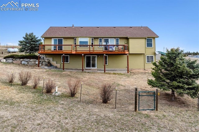 13255 Woodlake Rd, Elbert, CO 80106 - back of house featuring a deck