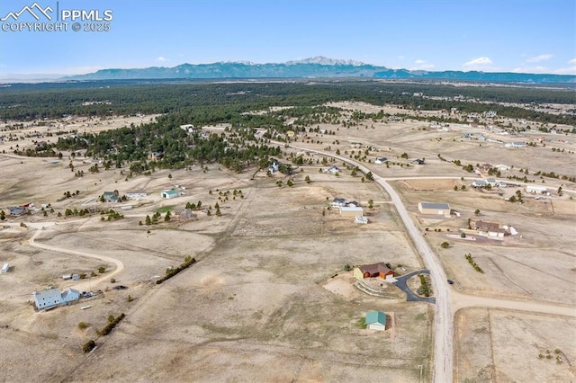 13255 Woodlake Rd, Elbert, CO 80106 - aerial view featuring a rural view, view of desert, and a mountain view
