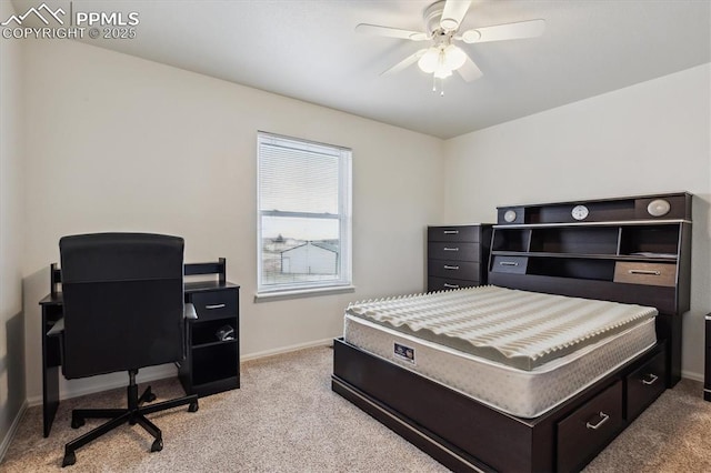 13255 Woodlake Rd, Elbert, CO 80106 - bedroom featuring baseboards, light carpet, and ceiling fan