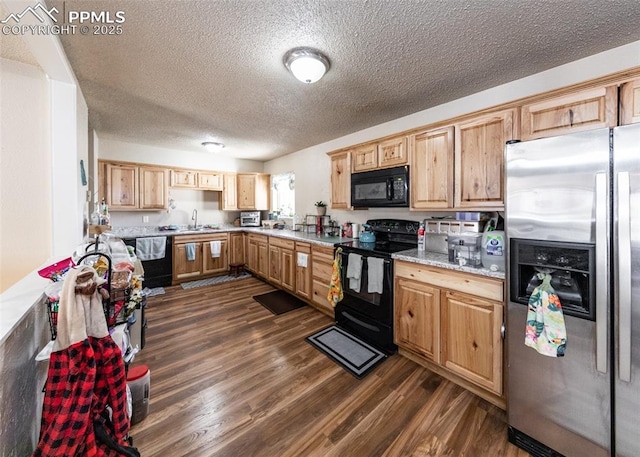 2914 Del Mar Cir, Colorado Springs, CO 80910 - kitchen with black appliances, dark wood-style flooring, a sink, light countertops, and a textured ceiling