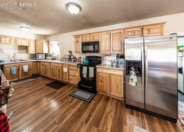 2914 Del Mar Cir, Colorado Springs, CO 80910 - kitchen with black appliances, a sink, dark wood-type flooring, light countertops, and a textured ceiling