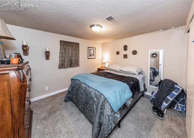 2914 Del Mar Cir, Colorado Springs, CO 80910 - carpeted bedroom with baseboards and a textured ceiling