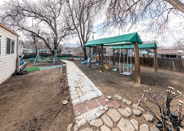 2914 Del Mar Cir, Colorado Springs, CO 80910 - view of jungle gym featuring fence