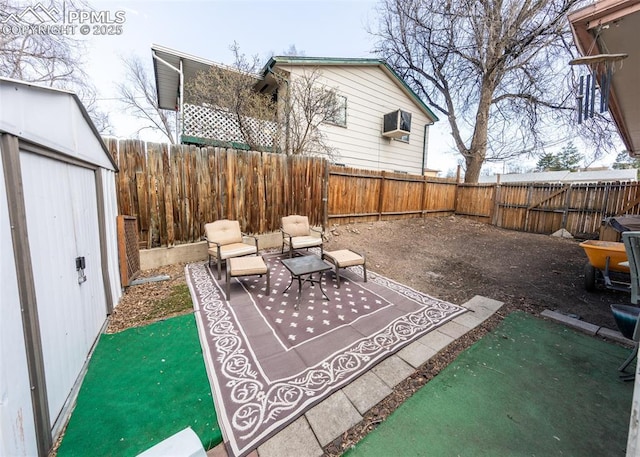 2914 Del Mar Cir, Colorado Springs, CO 80910 - view of patio featuring a fenced backyard and an outdoor structure