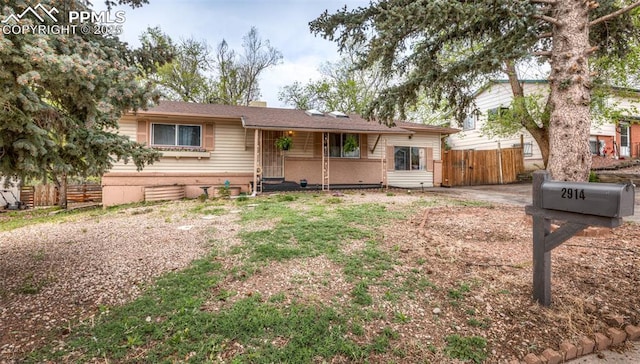 2914 Del Mar Cir, Colorado Springs, CO 80910 - ranch-style house with fence