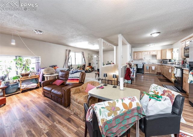 2914 Del Mar Cir, Colorado Springs, CO 80910 - dining room with a textured ceiling and dark wood-style floors