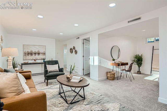 living room featuring baseboards, visible vents, recessed lighting, and carpet