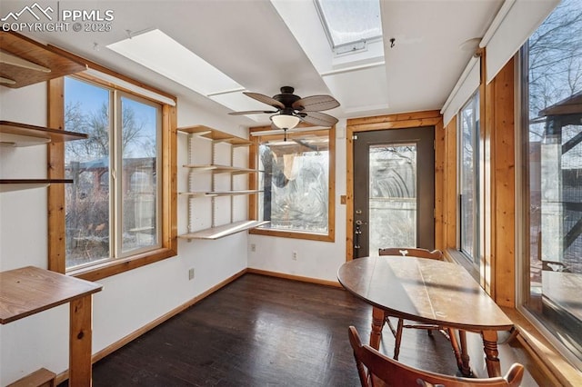 6745 Fielding Cir, Colorado Springs, CO 80911 - unfurnished sunroom featuring plenty of natural light and a skylight