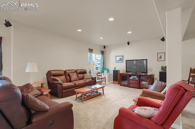 living room featuring light colored carpet and recessed lighting
