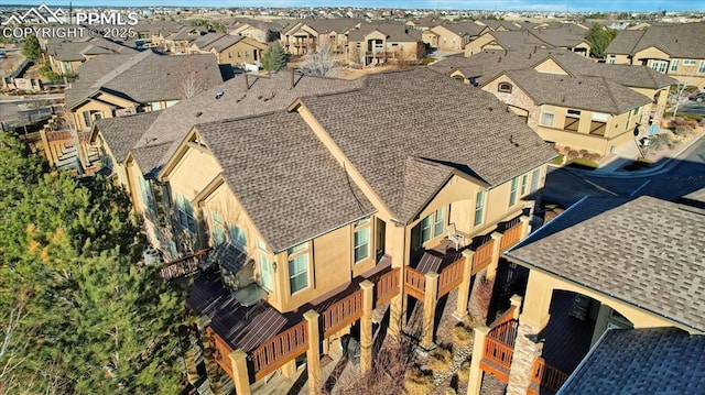 drone / aerial view with a residential view