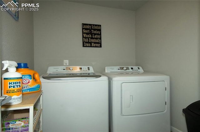 laundry room with independent washer and dryer and laundry area