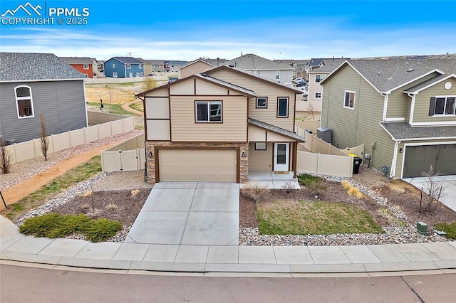 7718 Benecia Dr, Fountain, CO 80817 - view of front of home featuring a residential view, stone siding, and fence
