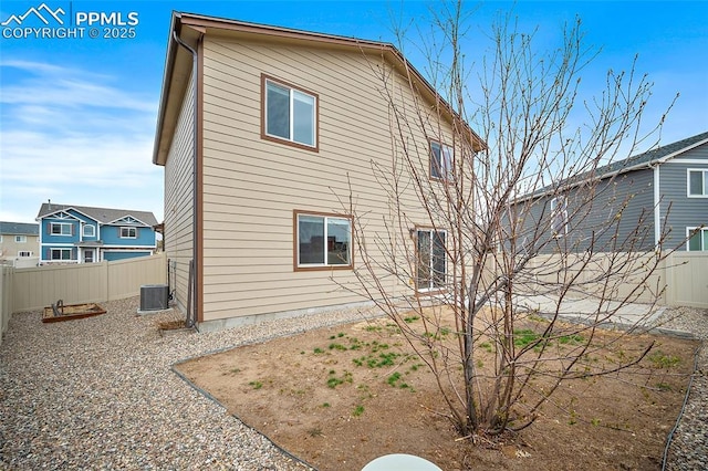 7718 Benecia Dr, Fountain, CO 80817 - back of house featuring a fenced backyard and central AC unit