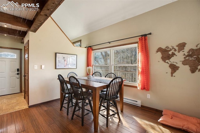dining area featuring baseboards, a baseboard radiator, and hardwood / wood-style floors