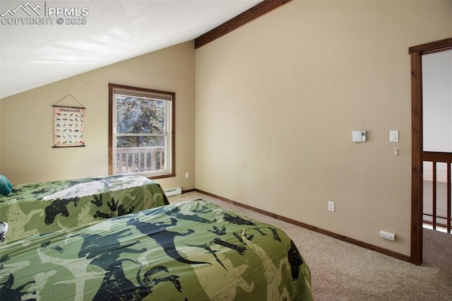 bedroom with baseboards, carpet, and vaulted ceiling