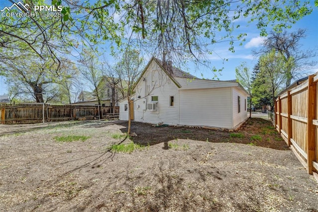 view of property exterior featuring a fenced backyard