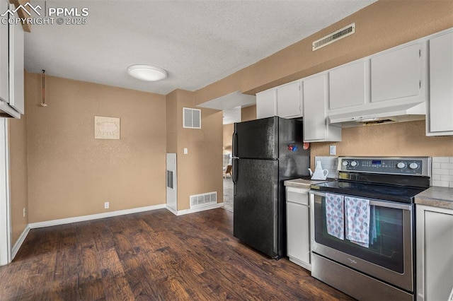 224 W Mill St, Colorado Springs, CO 80903 - kitchen with freestanding refrigerator, visible vents, under cabinet range hood, and electric stove