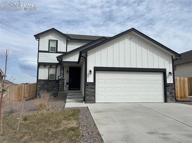 10776 Witcher Dr, Colorado Springs, CO 80925 - view of front of house with stone siding, a garage, driveway, and board and batten siding