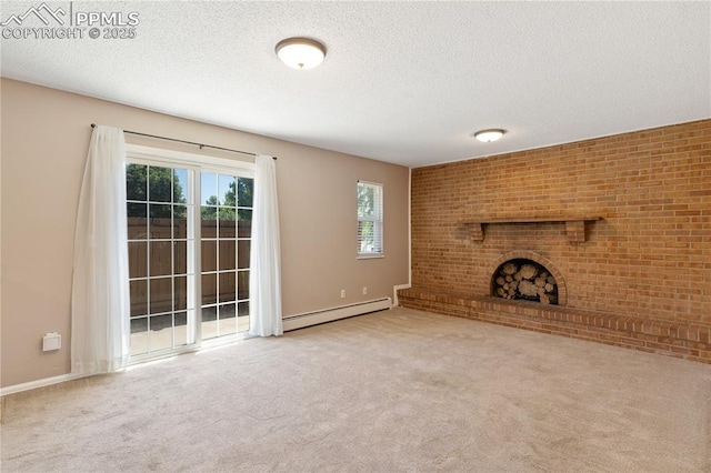 1187 Willow Bend Cir Unit A # 4, Colorado Springs, CO 80918 - unfurnished living room featuring a baseboard radiator, carpet floors, a brick fireplace, and a textured ceiling