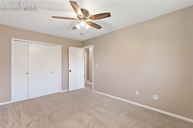 1187 Willow Bend Cir Unit A # 4, Colorado Springs, CO 80918 - unfurnished bedroom featuring light colored carpet, a closet, and a ceiling fan