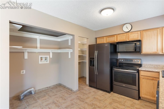 1187 Willow Bend Cir Unit A # 4, Colorado Springs, CO 80918 - kitchen with stainless steel appliances, light brown cabinetry, light countertops, and a textured ceiling