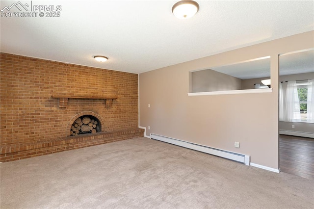 1187 Willow Bend Cir Unit A # 4, Colorado Springs, CO 80918 - unfurnished living room featuring a baseboard heating unit, carpet floors, a brick fireplace, and baseboard heating