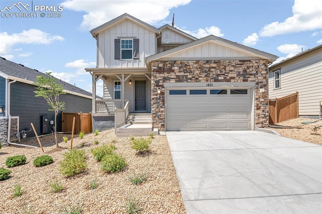 1821 Water Birch Way, Castle Rock, CO 80108 - view of front of house with driveway, covered porch, stone siding, board and batten siding, and a garage