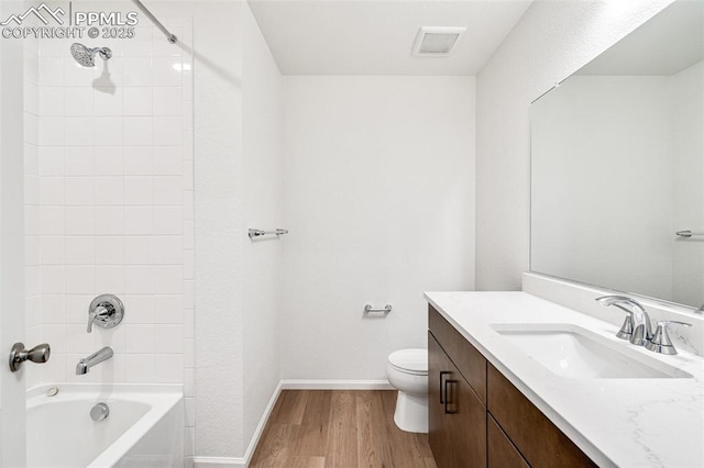 1821 Water Birch Way, Castle Rock, CO 80108 - full bath featuring toilet, vanity, wood finished floors, baseboards, and visible vents