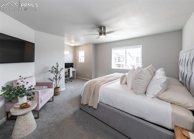 carpeted bedroom featuring a ceiling fan and baseboards