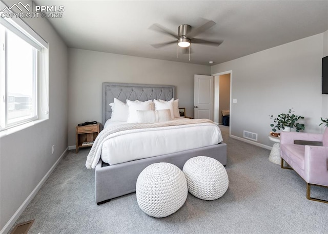 bedroom featuring carpet floors, baseboards, ceiling fan, and visible vents