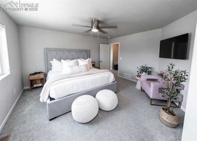 bedroom with a ceiling fan, carpet floors, baseboards, and visible vents
