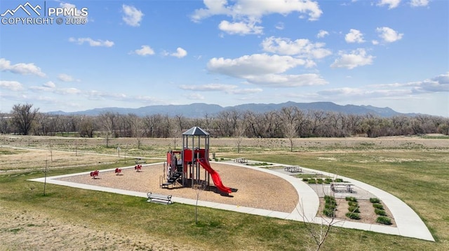 10713 Traders Pkwy, Fountain, CO 80817 - community play area featuring a lawn, a rural view, and a mountain view