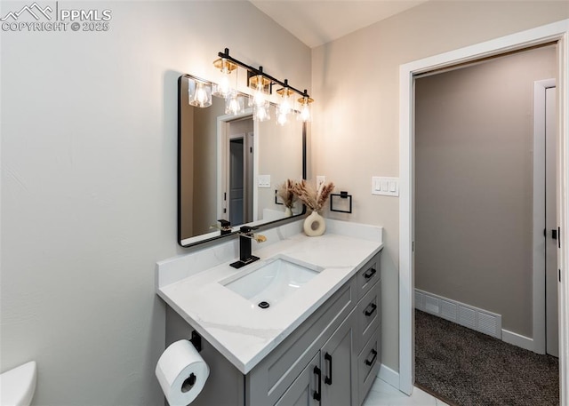 1021 Pioneer Ln, Colorado Springs, CO 80904 - bathroom featuring vanity and baseboards