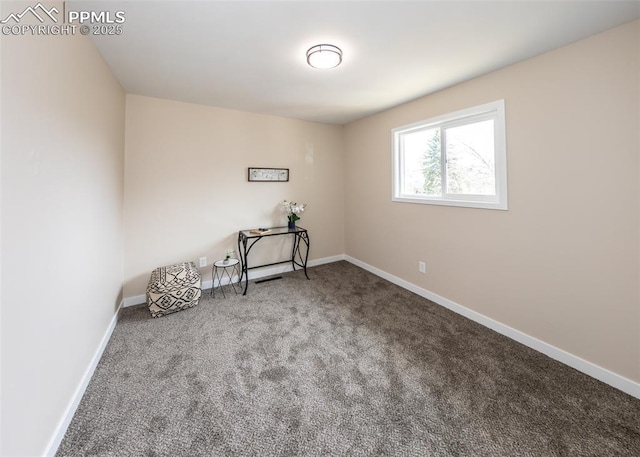 1021 Pioneer Ln, Colorado Springs, CO 80904 - unfurnished room featuring carpet and baseboards