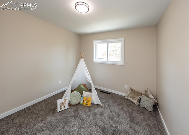 1021 Pioneer Ln, Colorado Springs, CO 80904 - rec room with carpet floors and baseboards