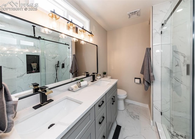 1021 Pioneer Ln, Colorado Springs, CO 80904 - full bath with marble finish flooring, baseboards, a marble finish shower, and double vanity