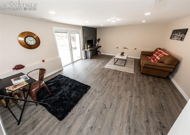 1021 Pioneer Ln, Colorado Springs, CO 80904 - living area featuring wood finished floors, baseboards, a fireplace, and recessed lighting