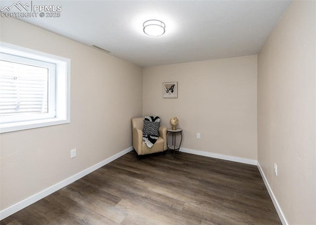 1021 Pioneer Ln, Colorado Springs, CO 80904 - unfurnished room with wood finished floors and baseboards