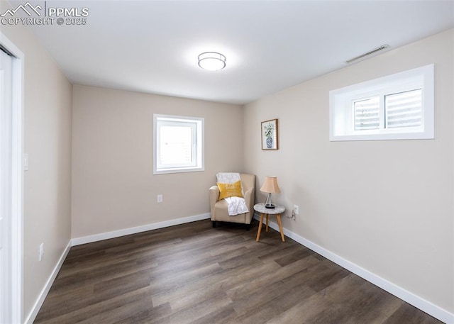1021 Pioneer Ln, Colorado Springs, CO 80904 - sitting room with dark wood finished floors and baseboards