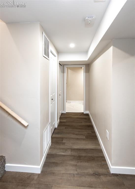1021 Pioneer Ln, Colorado Springs, CO 80904 - hall with baseboards, wood finished floors, and recessed lighting