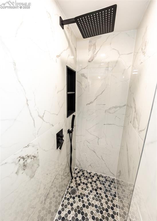 1021 Pioneer Ln, Colorado Springs, CO 80904 - bathroom featuring a marble finish shower