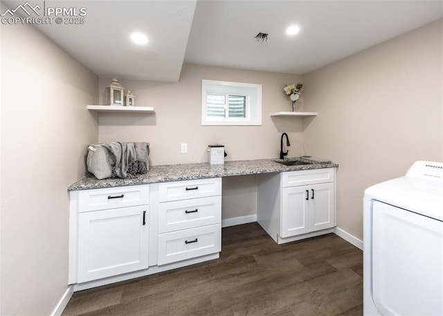 1021 Pioneer Ln, Colorado Springs, CO 80904 - washroom featuring washer / clothes dryer, dark wood-style flooring, cabinet space, recessed lighting, and baseboards