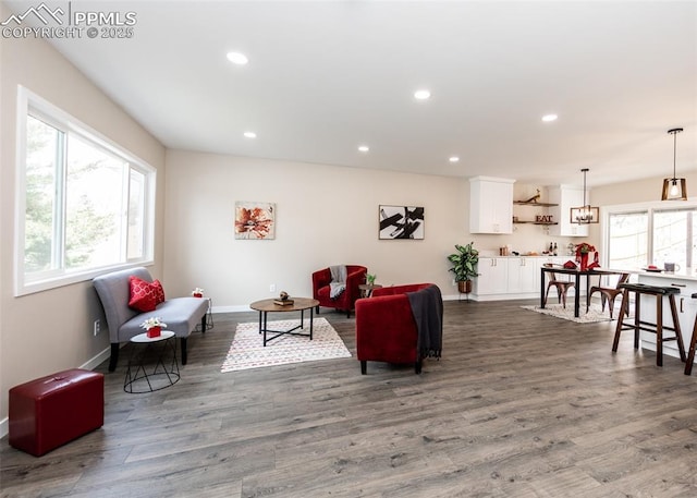 1021 Pioneer Ln, Colorado Springs, CO 80904 - living area featuring wood finished floors, recessed lighting, and baseboards