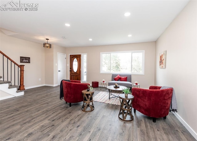 1021 Pioneer Ln, Colorado Springs, CO 80904 - living room with wood finished floors, stairs, baseboards, and recessed lighting
